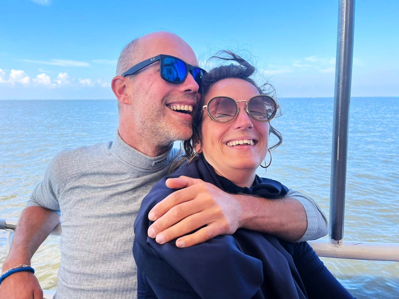 The two of us smiling by the sea