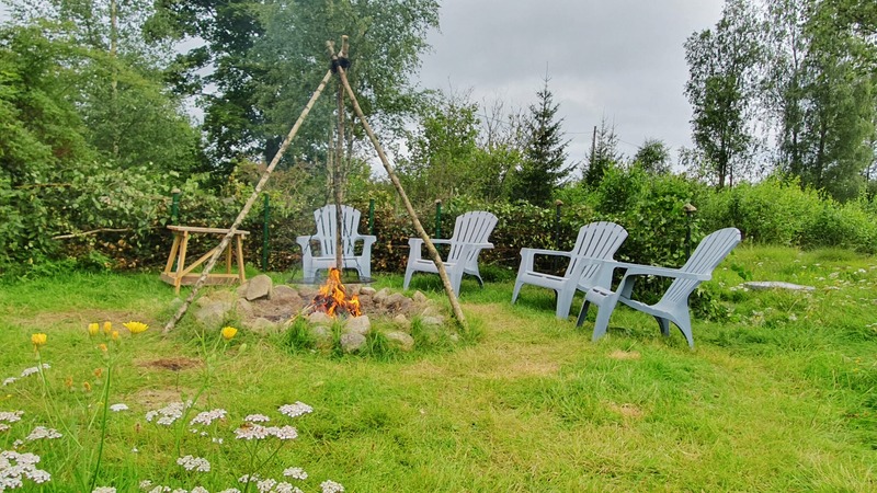 Chairs gathered around the fire pit